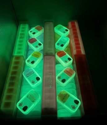 Sleek, durable metal design with dual-flavor switch, glowing LED tip, and rechargeable battery—BUY BOUTIQ SWITCH GLOW V4 DISPOSABLE VAPE ONLINE