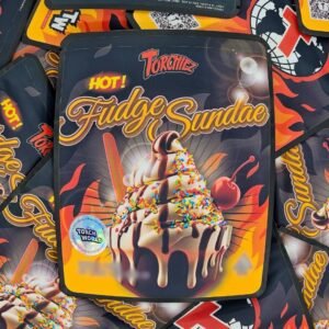 Hot Fudge Sundae offers rich chocolate aroma, creamy vanilla notes, relaxing effects, dense frosty buds, and a smooth, dessert-like cannabis experience.