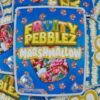 Fruity Pebblez Marshmallow is an indica-dominant hybrid cannabis strain (55% indica / 45% sativa) resulting from the cross of Green Ribbon,