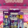 Snooze 2G Live Resin Disposable summons midnight calm, two grams of terpene-rich power forging serenity, dissolving chaos, and carrying souls into velvet.