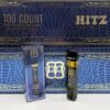 Experience the power of the Hitz Infinity Blue Label 2G Disposable. Premium oil, smooth vapor, and sleek design for a rich, long-lasting vape.